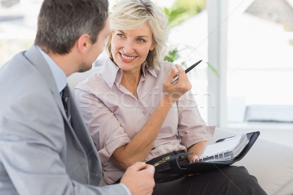 Businessman and his secretary with diary at home Stock photo © wavebreak_media