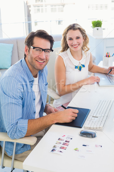 Casual photo editors using graphics tablet Stock photo © wavebreak_media