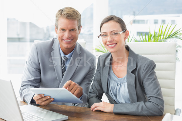 Smiling business partners working together Stock photo © wavebreak_media