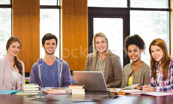 élèves enseignants portable bibliothèque ordinateur livre [[stock_photo]] © wavebreak_media