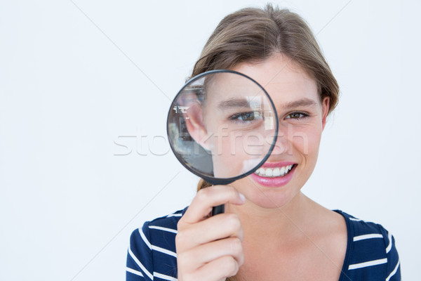 Glimlachende vrouw vergrootglas witte gelukkig mode Stockfoto © wavebreak_media