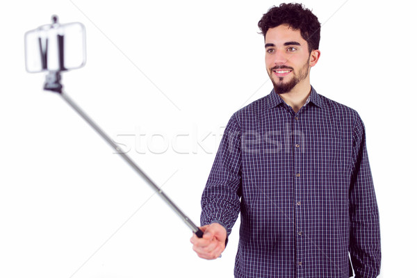 Toevallig man stick shot studio glimlachend Stockfoto © wavebreak_media