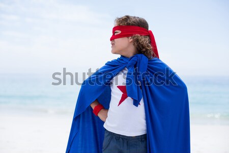 Composite image of masked girl pretending to be superhero Stock photo © wavebreak_media