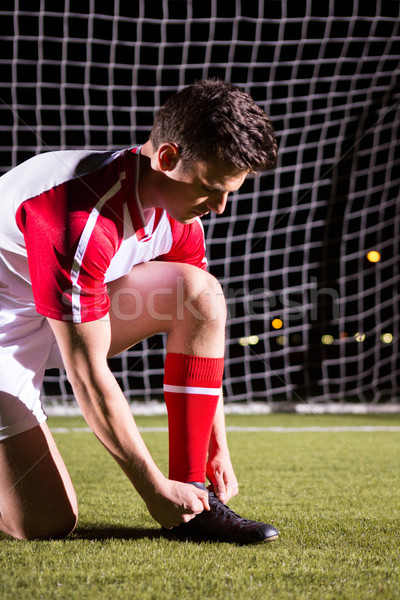 Jovem masculino jogador de futebol meta postar campo de futebol Foto stock © wavebreak_media