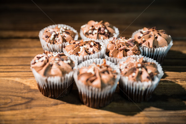 Chocolate cupcakes on a table Stock photo © wavebreak_media