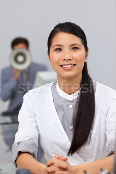 Businessman shouting through a megaphone  Stock photo © wavebreak_media