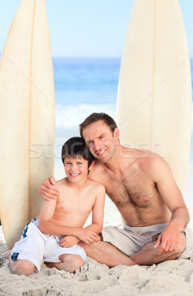 Father and son with their surfboards Stock photo © wavebreak_media