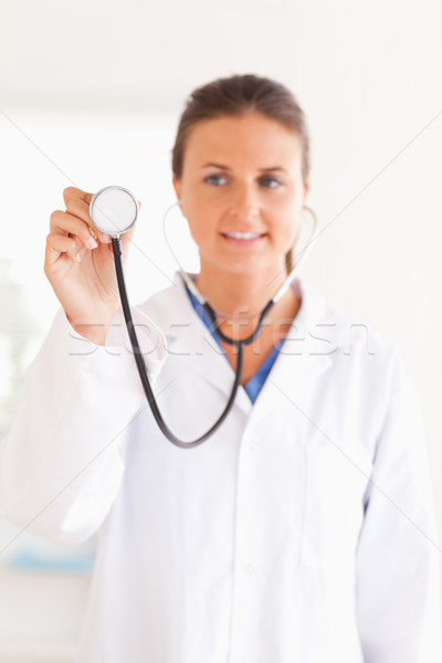 Gülen doktor stetoskop bakıyor kamera Stok fotoğraf © wavebreak_media