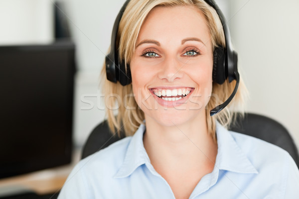 Close Up Of A Blonde Woman Wearing Headset Looking Into Camera In Her Office Stock Photo C Wavebreak Media Ltd Wavebreak Media Stockfresh