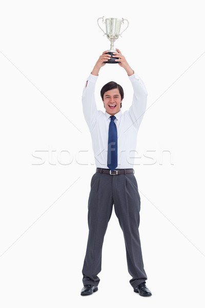 Successful tradesman holding cup against a white background Stock photo © wavebreak_media