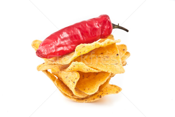Pepper upon a small stack of crisps against white background Stock photo © wavebreak_media