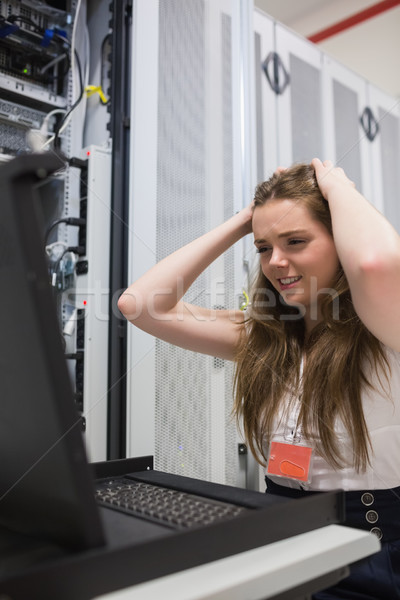 Woman stressing over the servers in data center Stock photo © wavebreak_media