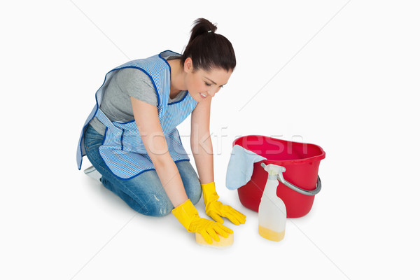 Cleaning woman washing the floor on white background Stock photo © wavebreak_media