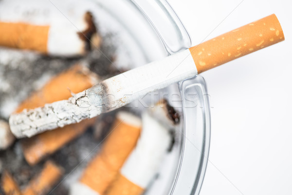 сигарету пепельница белый дым прикладом Сток-фото © wavebreak_media