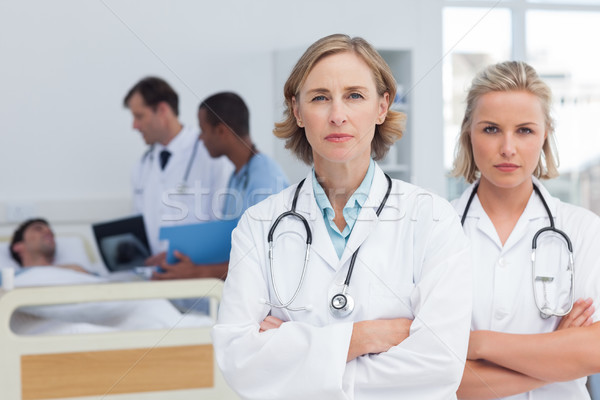 Two serious women doctors standing Stock photo © wavebreak_media