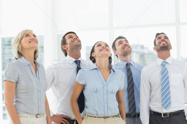 Business team looking up in office Stock photo © wavebreak_media