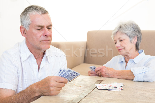 Casal cartas de jogar casal de idosos casa mulher amor Foto stock © wavebreak_media