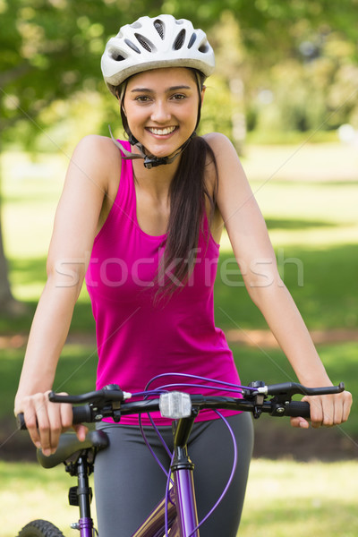 Fit Young Woman With Helmet Riding Bicycle Stock Photo C Wavebreak Media Ltd Wavebreak Media 5653251 Stockfresh