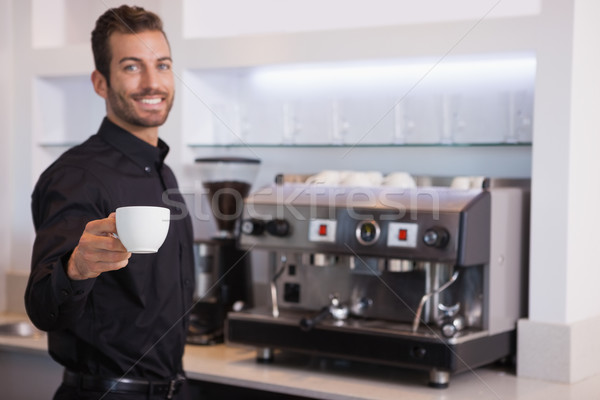 Yakışıklı barista teklif fincan kahve Stok fotoğraf © wavebreak_media