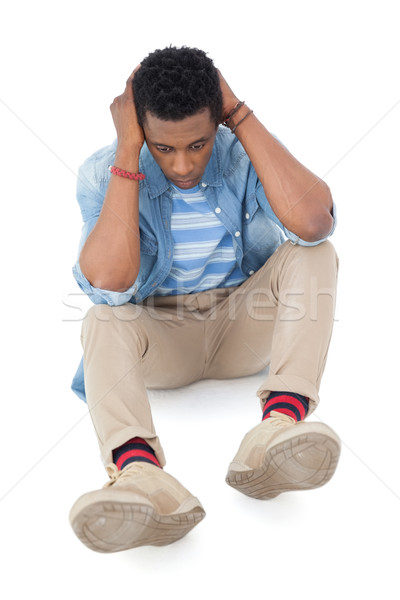 Full length of a thoughtful young man Stock photo © wavebreak_media