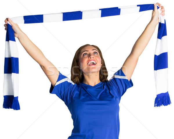 Pretty football fan waving scarf Stock photo © wavebreak_media