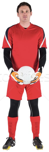 Goalkeeper in red looking at camera Stock photo © wavebreak_media