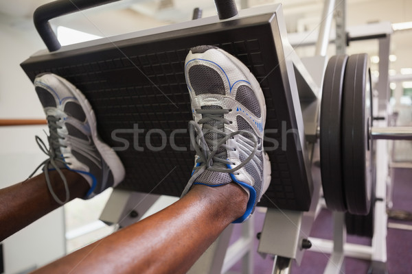 Weightlifter doing leg presses in gym Stock photo © wavebreak_media