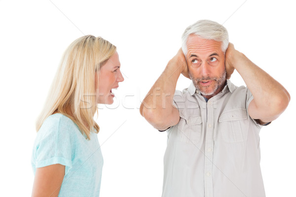 Unhappy couple having an argument with man not listening Stock photo © wavebreak_media