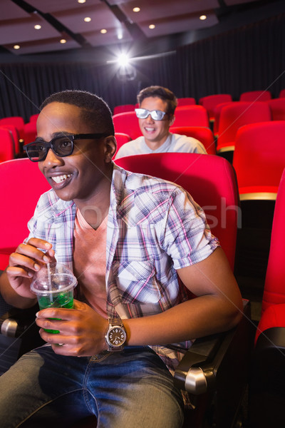 Young friends watching a 3d film Stock photo © wavebreak_media