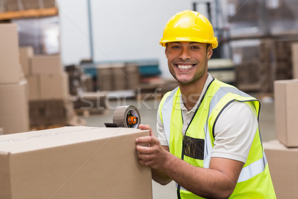 Stock photo: Worker preparing goods for dispatch