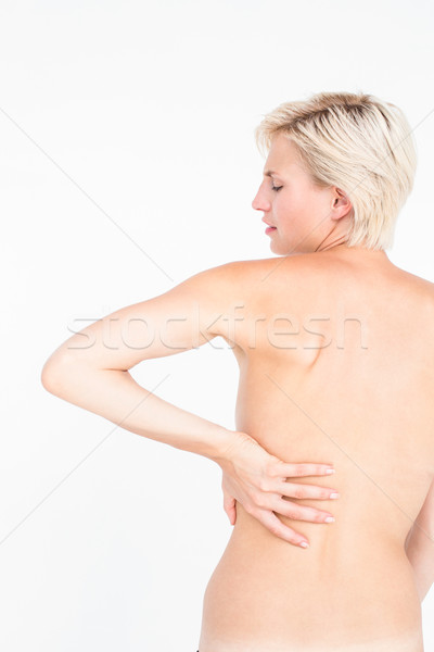 Beautiful woman with back pain  Stock photo © wavebreak_media