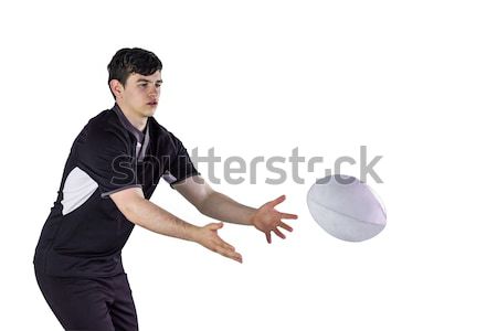 Rugby player doing a side pass Stock photo © wavebreak_media