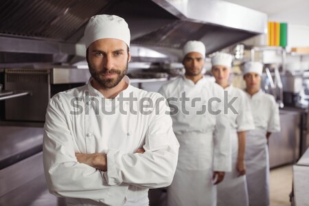 Chef preparing food in the commercial kitchen Stock photo © wavebreak_media