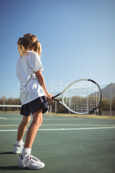 Mädchen halten Tennisschläger Gericht Seitenansicht stehen Stock foto © wavebreak_media