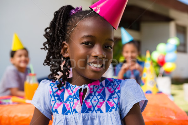Retrato fiesta de cumpleaños nina alimentos Foto stock © wavebreak_media