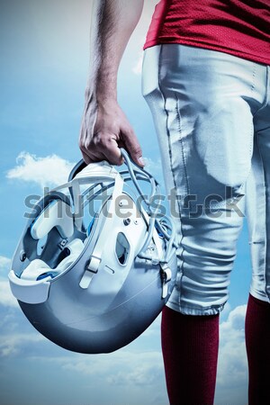 American football player holding helmet Stock photo © wavebreak_media