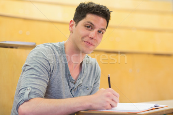 Gülen erkek öğrenci sınıf ders salon Stok fotoğraf © wavebreak_media