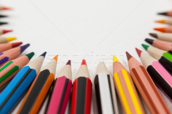 Stock photo: Colored pencils arranged in a semi-circle
