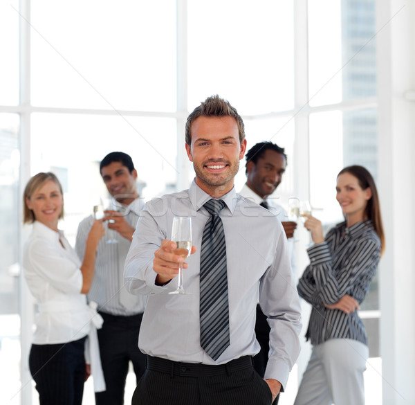 Stock photo: Sucessful Business team drinking champagne