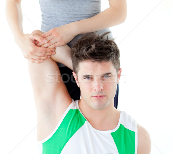 Muscular man doing fitness exercises with a woman in gym Stock photo © wavebreak_media