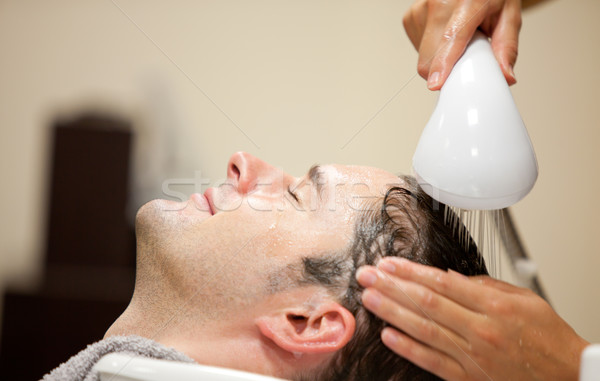 Jeune homme cheveux salon femme main Photo stock © wavebreak_media