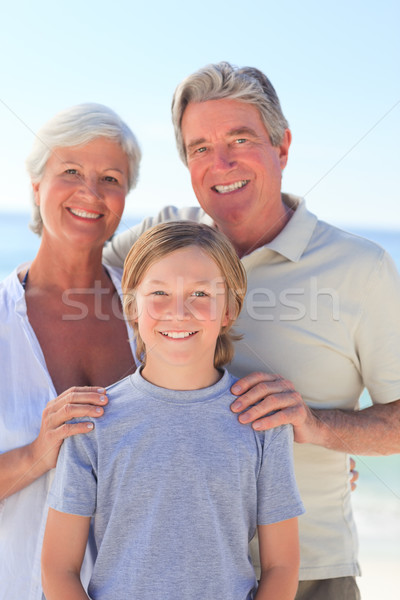дедушка и бабушка внук пляж небе воды улыбка Сток-фото © wavebreak_media