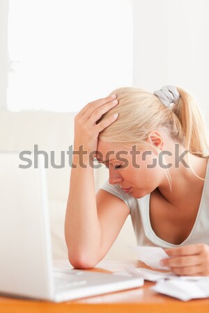 Portrait of a cute woman squatting on a weighing machine in her bedroom Stock photo © wavebreak_media