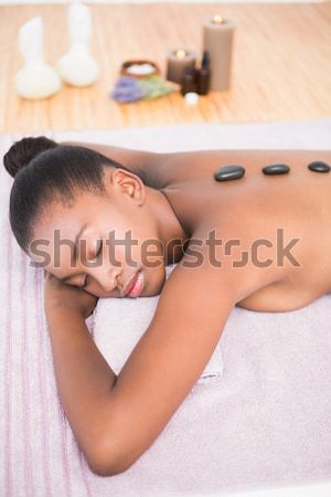 Portrait of a woman looking at the camera while her fiance is sleeping in their bedroom Stock photo © wavebreak_media