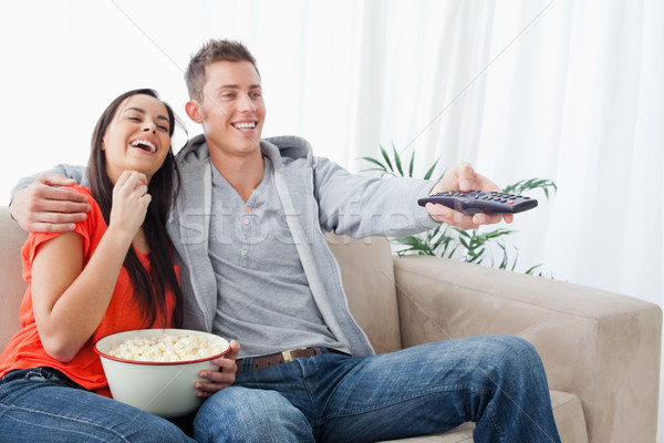 Stock foto: Lachen · Paar · Couch · Popcorn · ansehen