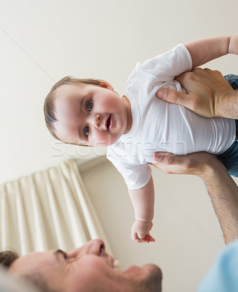 Adorabile baby effettuati padre view Foto d'archivio © wavebreak_media