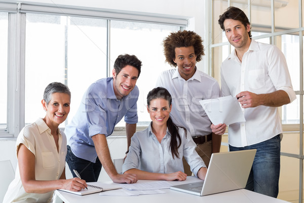 Attractive business people smiling in the workplace Stock photo © wavebreak_media