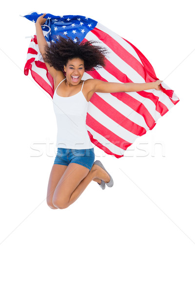 Bella ragazza bandiera americana jumping sorridere fotocamera Foto d'archivio © wavebreak_media