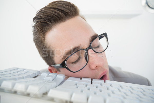 5727605_stock-photo-nerdy-businessman-sleeping-on-keyboard.jpg