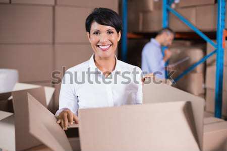 Kobiet kierownik za pomocą laptopa magazynu portret kobieta Zdjęcia stock © wavebreak_media